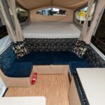 Lounge in the Jayco Swan Camper Trailer
