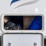 External access to the storage under the lounge in the Jayco Swan Camper Trailer