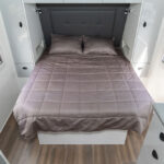 Island bed in the Ultimate Family Twin Bunk Caravan