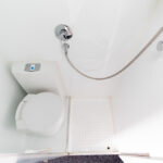 Combo shower and toilet in the Custom Campervan Conversion