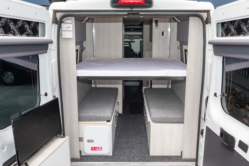 electric drop-down bed in the Custom Campervan Conversion