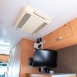 TV and air-conditioner in the Getaway Campervan