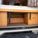 storage area under the bed in the Getaway Campervan
