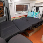 Dinette bed conversion in the Southern Spirit 4x4 Campervan