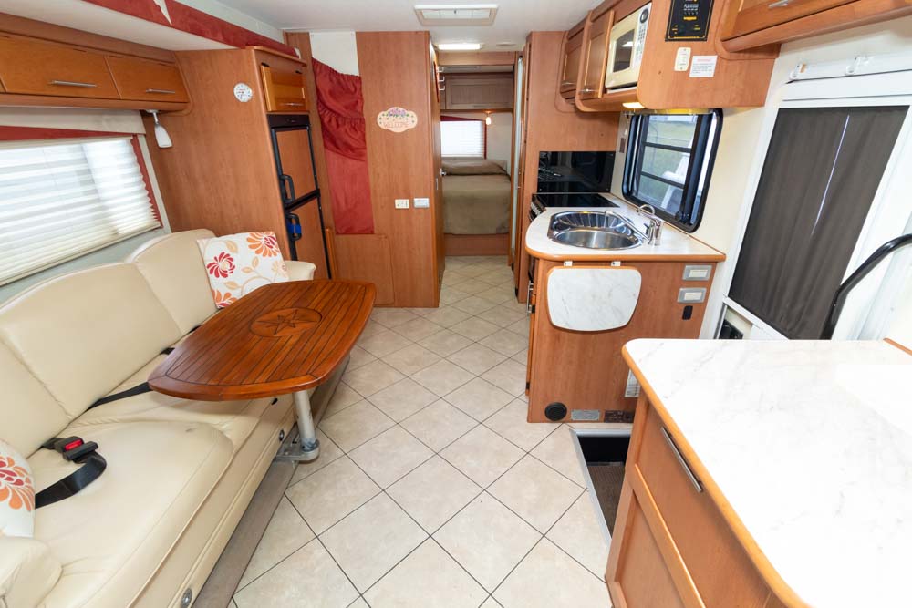 Looking to the rear inside the Winnebago Longreach C2735SL Motorhome