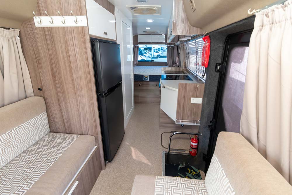 Looking to the rear inside the Toyota Coaster Motorhome