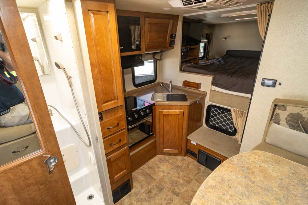 Looking to the frony inside the Lance 855S Slide-On Camper