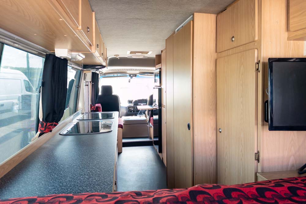 Looking to the front inside the Toyota Coaster Motorhome
